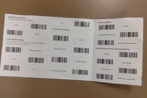 Barcode handleiding, achterkant. Bevat instrucies en barcodes voor instellingen.
